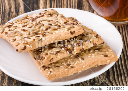 crispy bread with seeds of sunflower, flax and crispy bread with seeds of sunflower, flax and 28166202