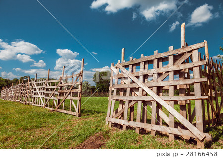 wooden rustic fence and village landscape 28166458