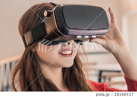 beautiful young girl with virtual reality headset beautiful young girl with virtual reality headset 28166517