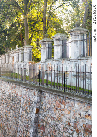 Fortress wall with trees in old town European city 28166520