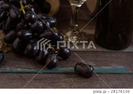 grapes and wine on a wooden. 28176130