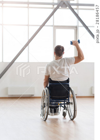 Athletic young invalid exercising with weights in Athletic young invalid exercising with weights in 28186457