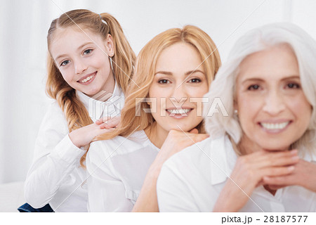 Cheerul delighted family members resting at home Cheerul delighted family members resting at home 28187577