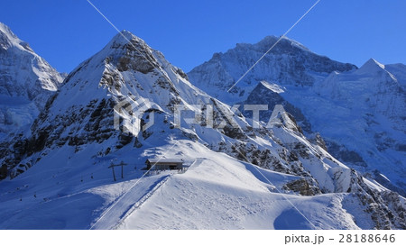 Snow covered mountains Lauberhorn and Jungfrau 28188646