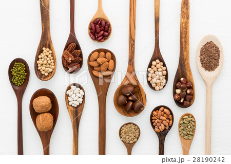Different kind of beans and lentils in wooden spoo Different kind of beans and lentils in wooden spoo 28190242