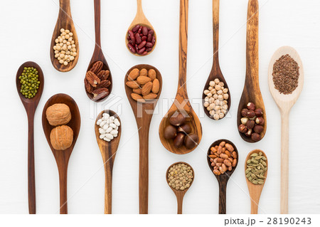 Different kind of beans and lentils in wooden spoo Different kind of beans and lentils in wooden spoo 28190243