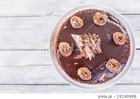 Chocolate Cake decorated with chocolate chips Chocolate Cake decorated with chocolate chips 28190906