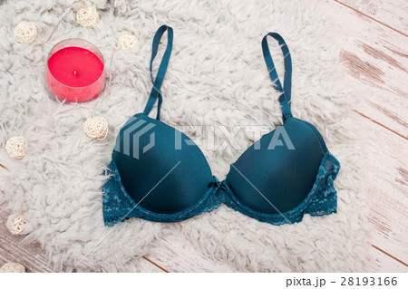 Fashion concept. Emerald bra with artificial fur Fashion concept. Emerald bra with artificial fur 28193166