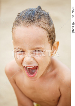 Beautiful kid on the beach Beautiful kid on the beach 28196089