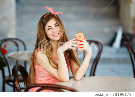 cute girl smiling and looking at the camera 28196179