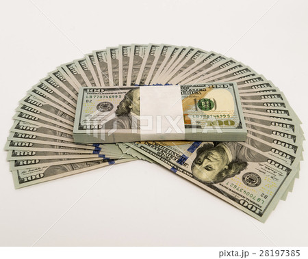 Stack of money in US dollars cash banknotes 28197385