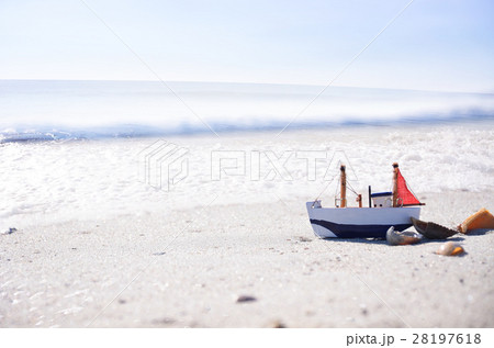 Small ship on the beach Small ship on the beach 28197618
