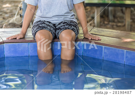 Nature spa, Legs of woman in hot springs pond, Mae hong son, Thailand 28198487