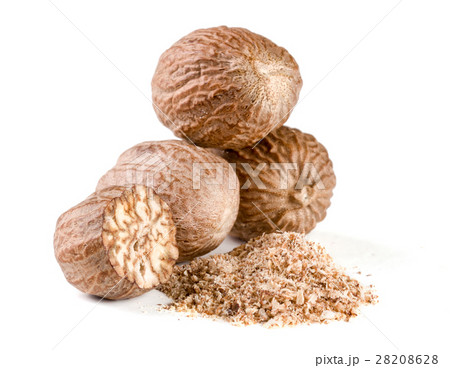 Three nutmeg and powder isolated on white Three nutmeg and powder isolated on white 28208628