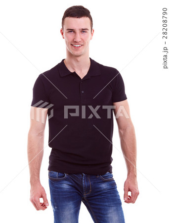 Man in a polo shirt stands leaning on railing 28208790