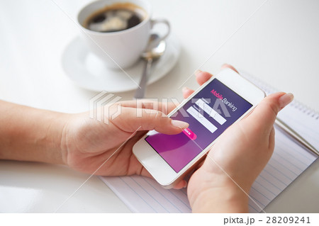 Female hands using mobile banking Female hands using mobile banking 28209241