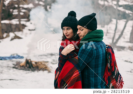 Guy and girl at a picnic. 28213519