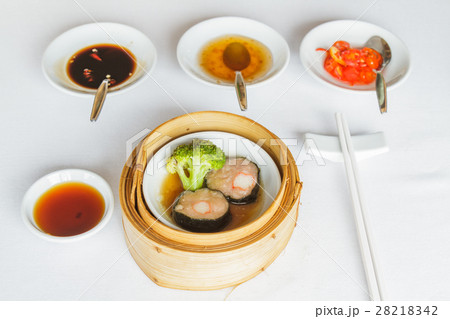 Steamed pork and seaweed rolls 28218342