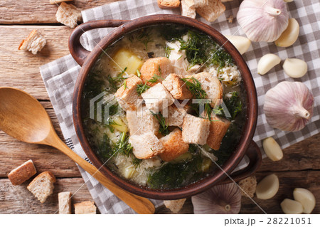 garlic soup with croutons close-up in a bowl 28221051