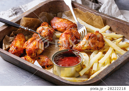 Fried chicken legs with french fries 28222218