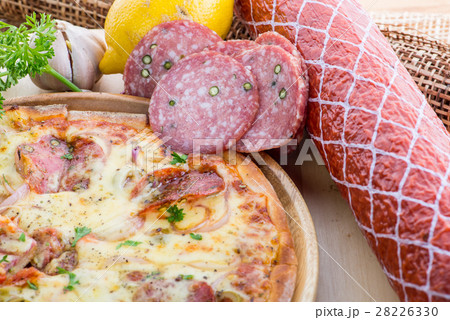 ITALIAN PIZZA on wooden table.hot tasty salami 28226330