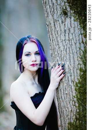 Portrait of the gothic woman in the dark forest 28230643