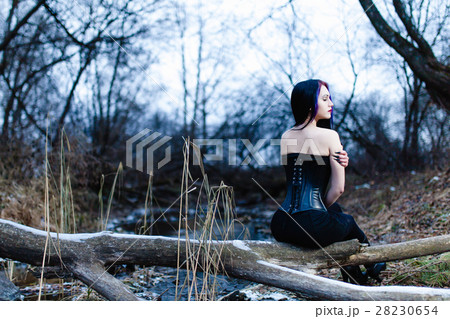 Portrait of the gothic woman near the cold creek 28230654