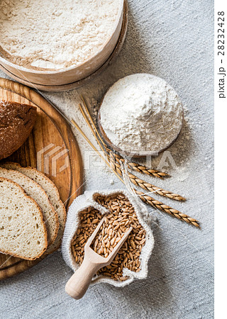 Wheat and flour on the table Wheat and flour on the table 28232428