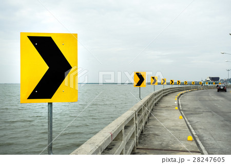 Curve road sign, signal turn right on the bridge Curve road sign, signal turn right on the bridge 28247605