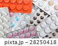 Many Pills and Tablets on table 28250418