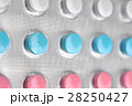 Color pills tablets background 28250427