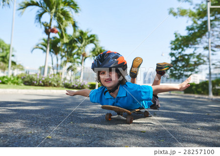 Funny little boy on skateboard Funny little boy on skateboard 28257100