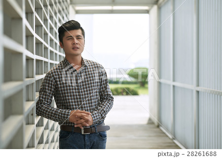 Confident young employee in casualwear Confident young employee in casualwear 28261688