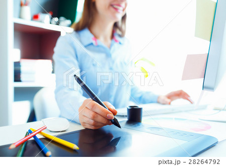 Graphic designer drawing on graphic tablet Graphic designer drawing on graphic tablet 28264792