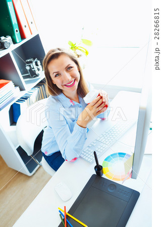Graphic designer working at the home office Graphic designer working at the home office 28266815