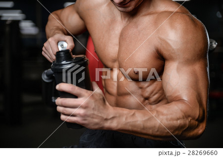 Handsome fitness model train in gym gain muscl 28269660
