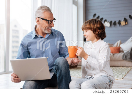Cute happy boy having tea Cute happy boy having tea 28269702