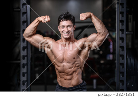 Handsome bodybuilder training in the gym sexy m Handsome bodybuilder training in the gym sexy m 28271351