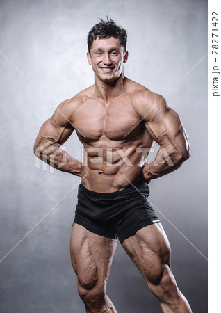 Handsome bodybuilder training in the gym sexy m Handsome bodybuilder training in the gym sexy m 28271422
