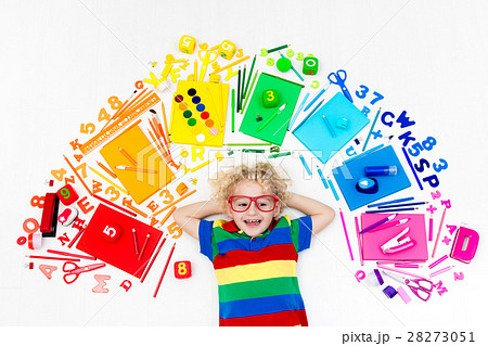 Child with school and drawing supplies 28273051
