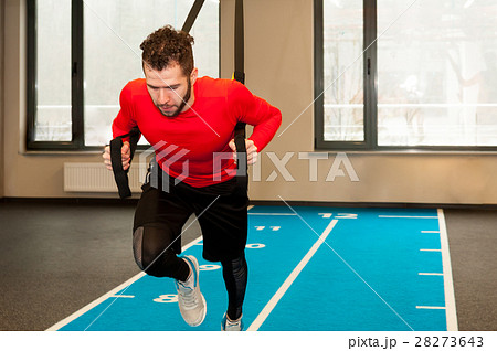 white curly bearded sporty man exercising with 28273643