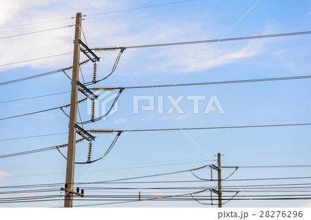 Old electricity post against blue sky with cloud 28276296