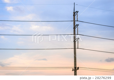 Old electricity post against blue sky with cloud Old electricity post against blue sky with cloud 28276299