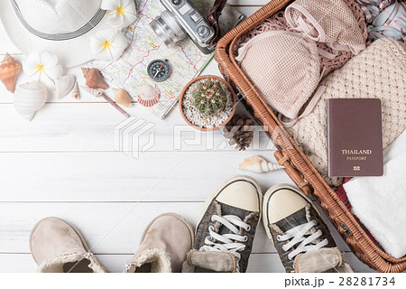 Travel accessories costumes on wood background Travel accessories costumes on wood background 28281734