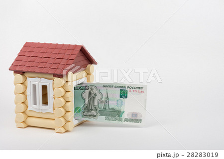 From toy house door sticks banknote thousand Russian rubles 28283019