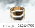 Old golden ring on a gray background 28284755