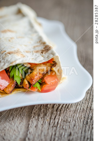 Tortilla or burritos closeup Tortilla or burritos closeup 28285387