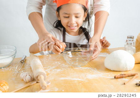 Close up shot of Asian little girl breaking the 28291245