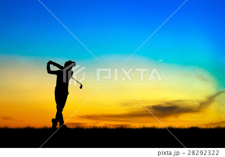silhouette golfer playing golf during at sunset 28292322