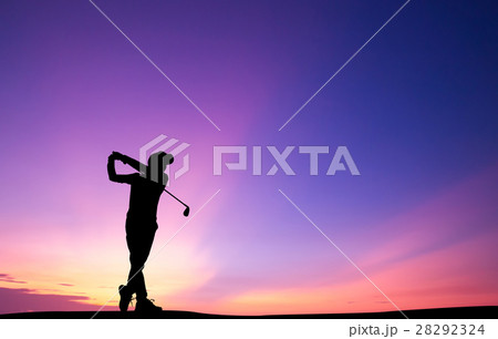 silhouette golfer playing golf during at sunset 28292324